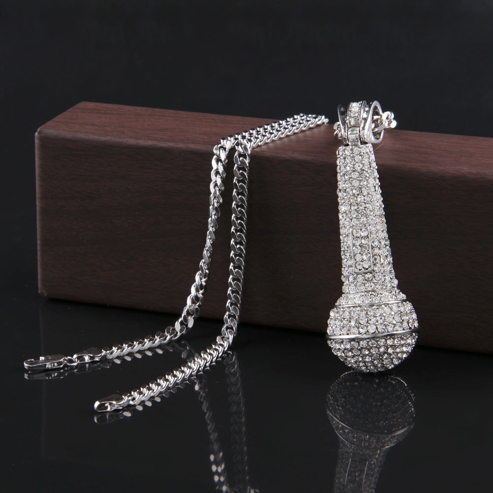 Hip-hop diamond-encrusted microphone necklaces.