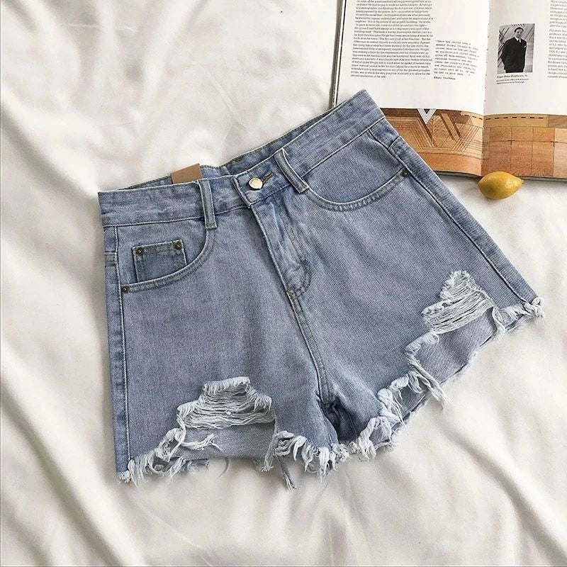 Pocket Tassel Perforated Denim Shorts Female