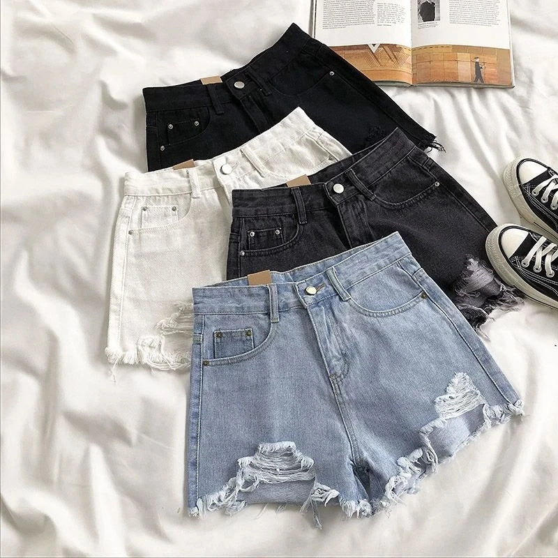 Pocket Tassel Perforated Denim Shorts Female