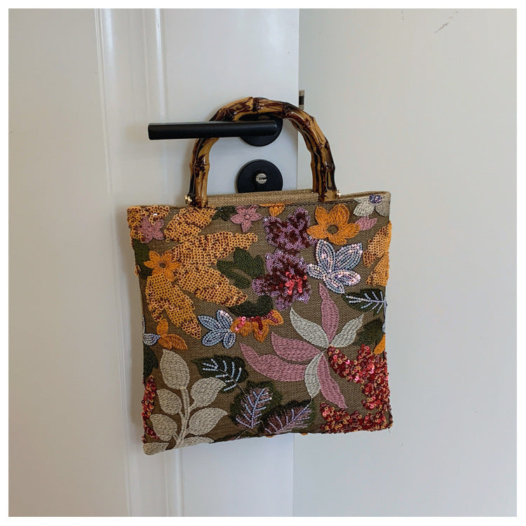 Embroidered sequins linen bamboo handle tote bag