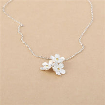 triangle forget me not necklace