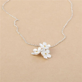 triangle forget me not necklace