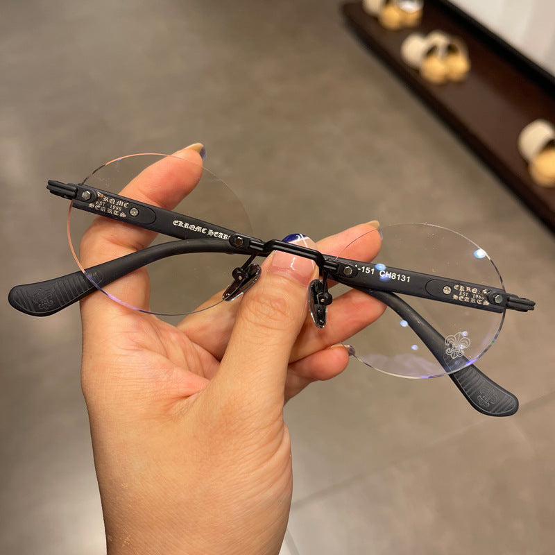 Chrome Hearts frameless round punched retro glasses
