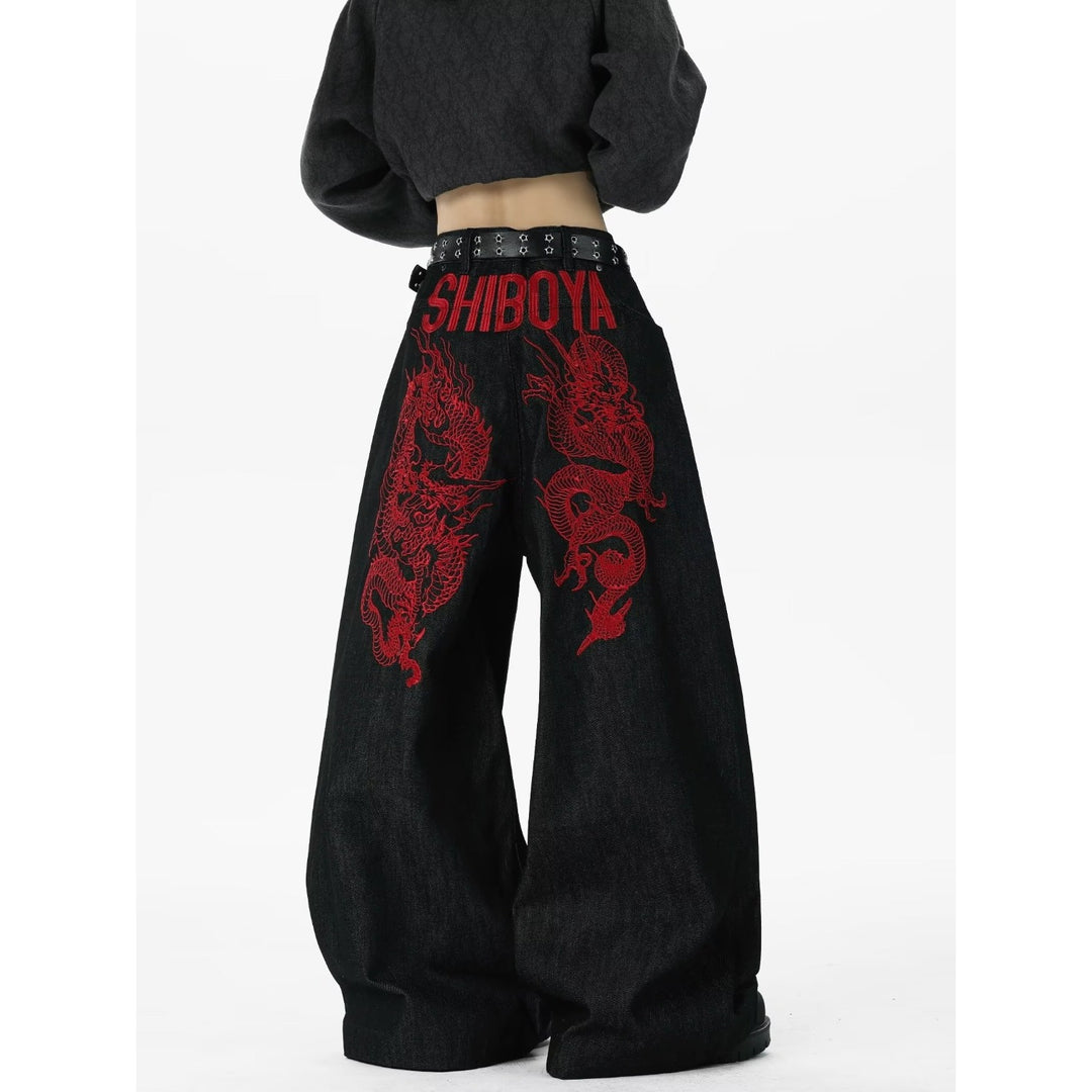 Red dragon embroidered curved blade jeans