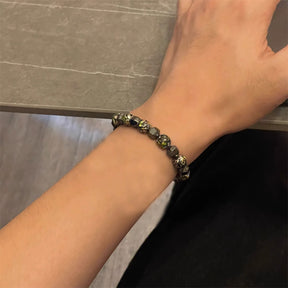 Irregular black gallstone stitching bracelet