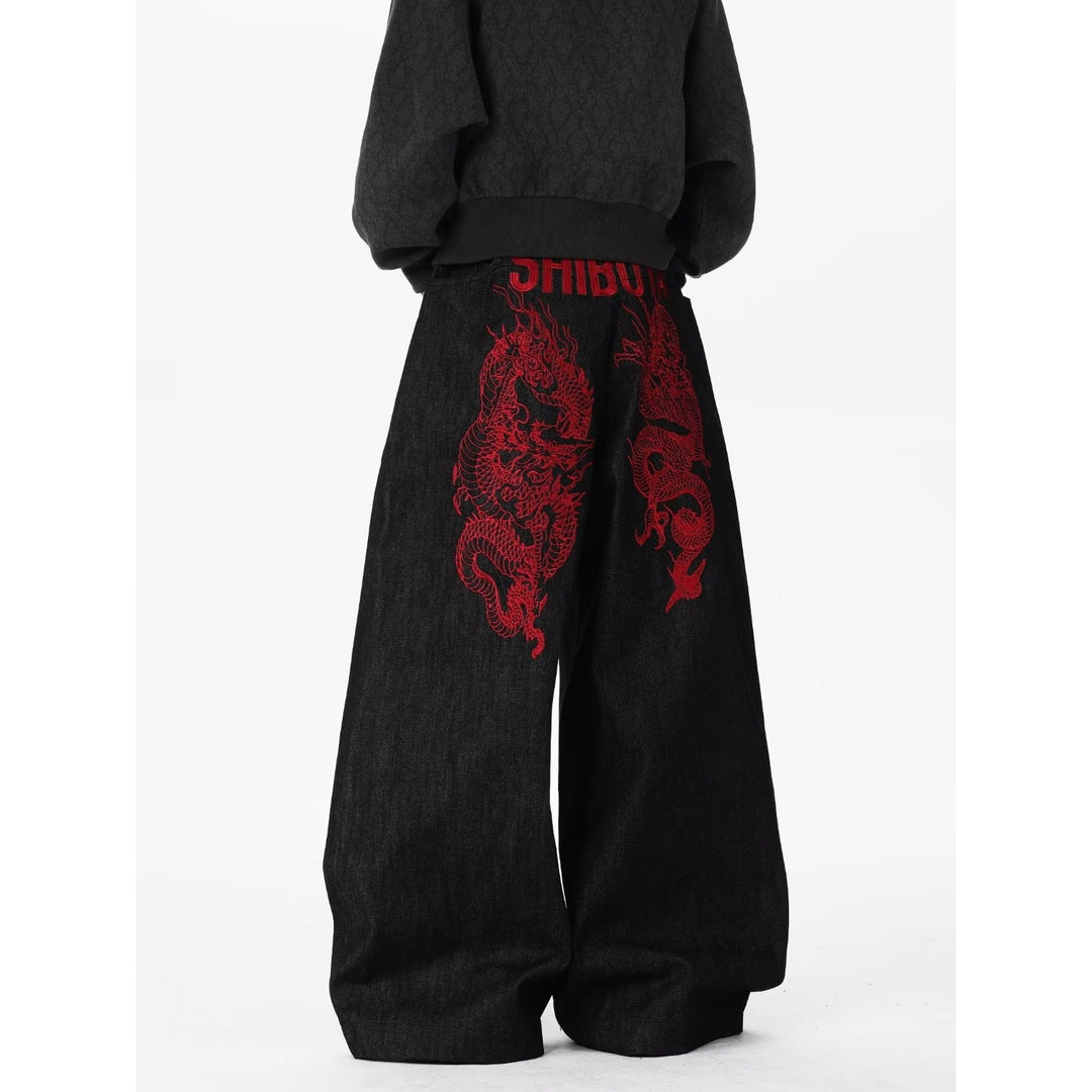Red dragon embroidered curved blade jeans