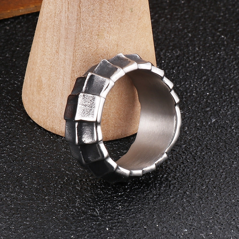 Distressed, minimalist, and stylish dragon-shaped diamond ring