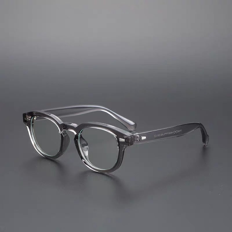 Thick-rimmed round transparent glasses