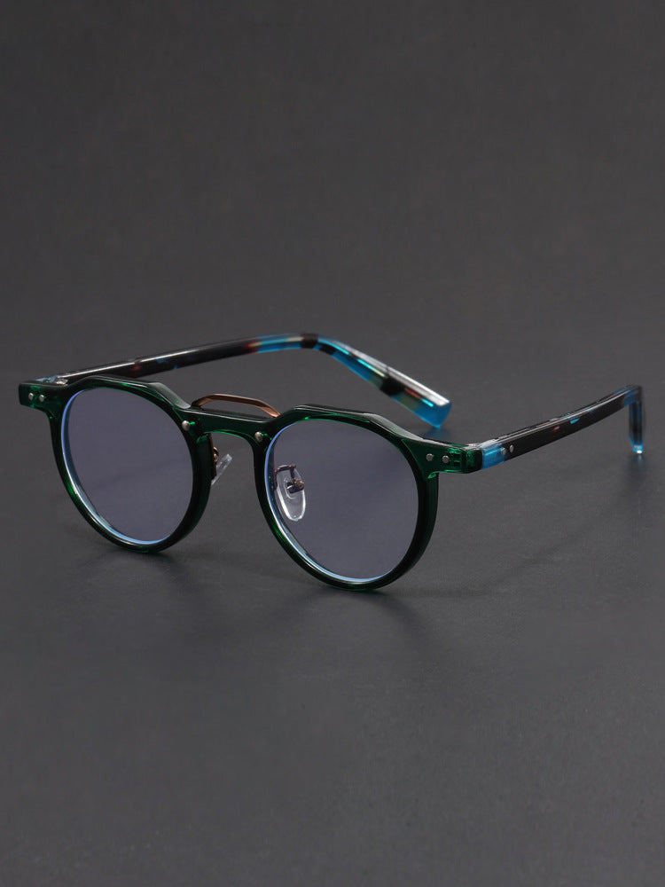 Hexagonal-rimmed aviator style sunglasses.