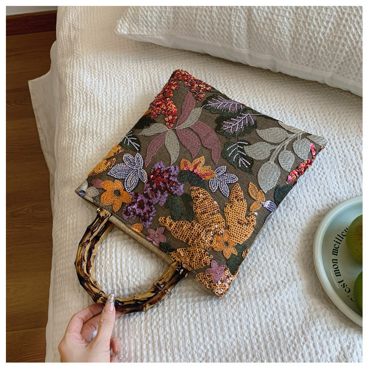 Embroidered sequins linen bamboo handle tote bag