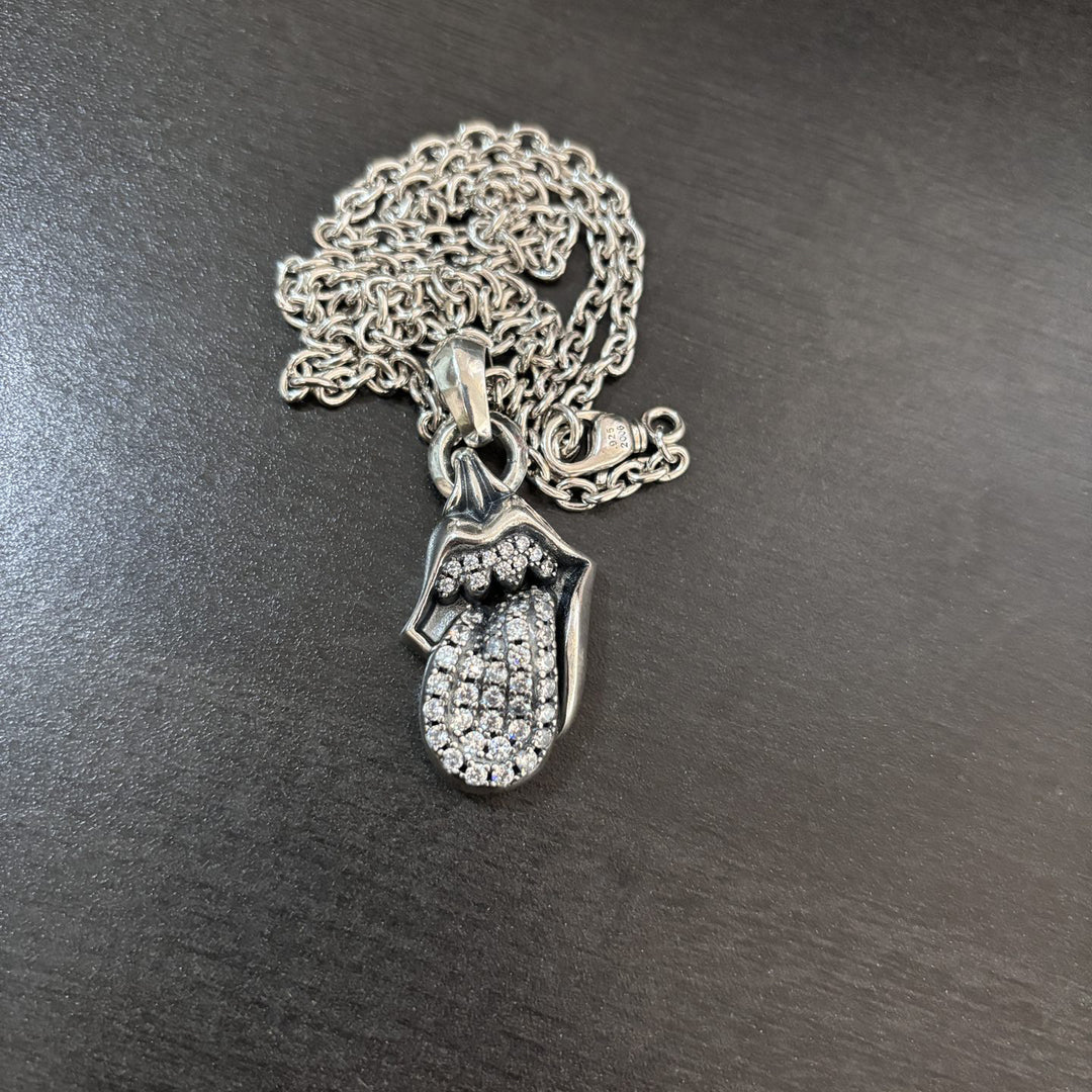 Chrome Hearts diamond-encrusted tongue pendant