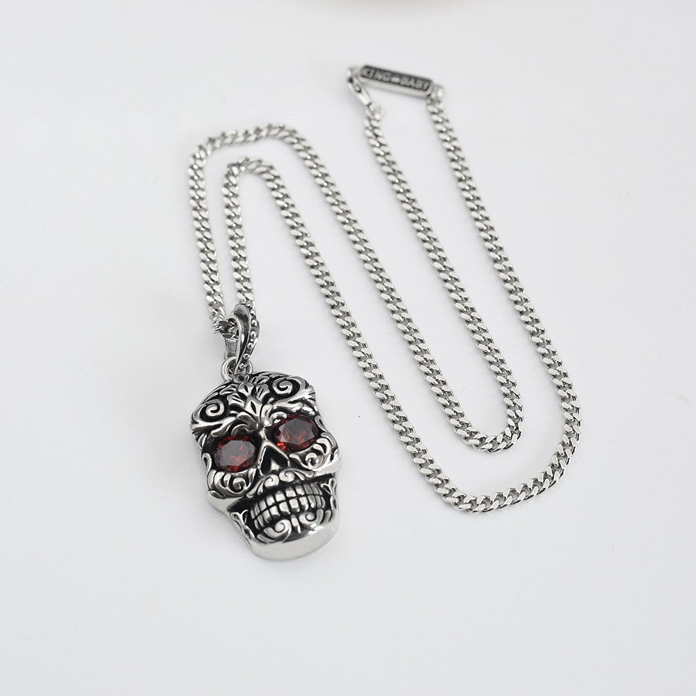 Retro Baroque garnet eye skull pendant