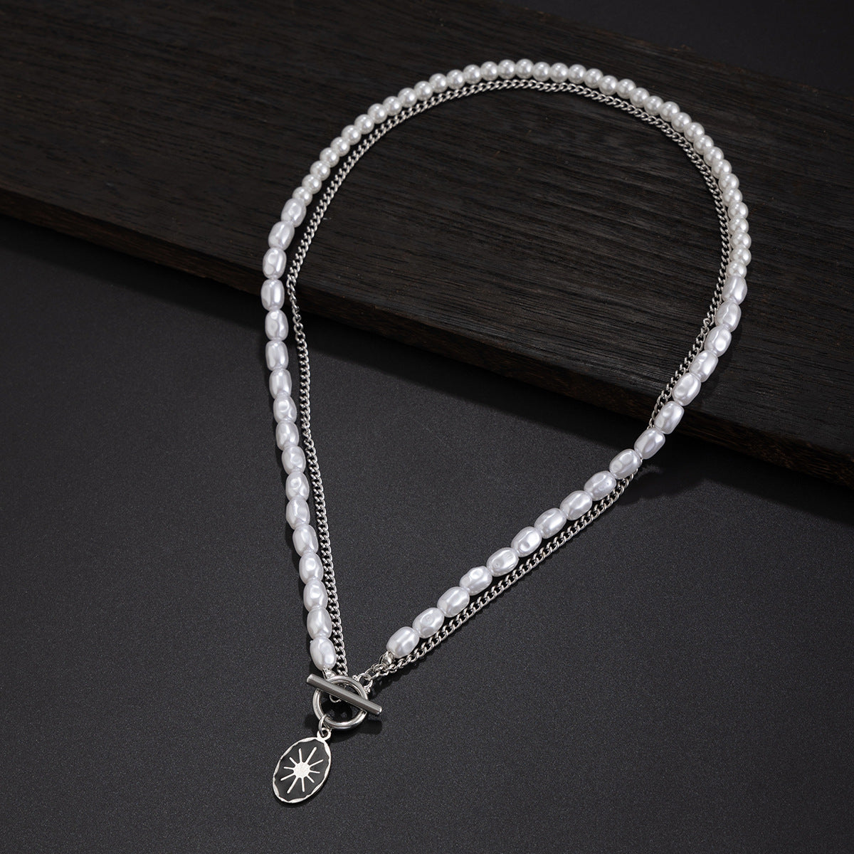 Oval sun OT buckle pearl necklace