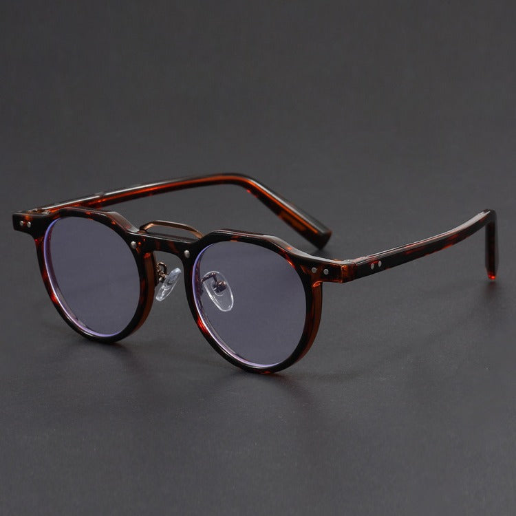 Hexagonal-rimmed aviator style sunglasses.