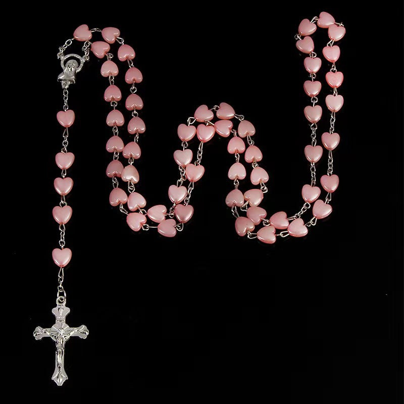 Heart-shaped pink rosary necklace