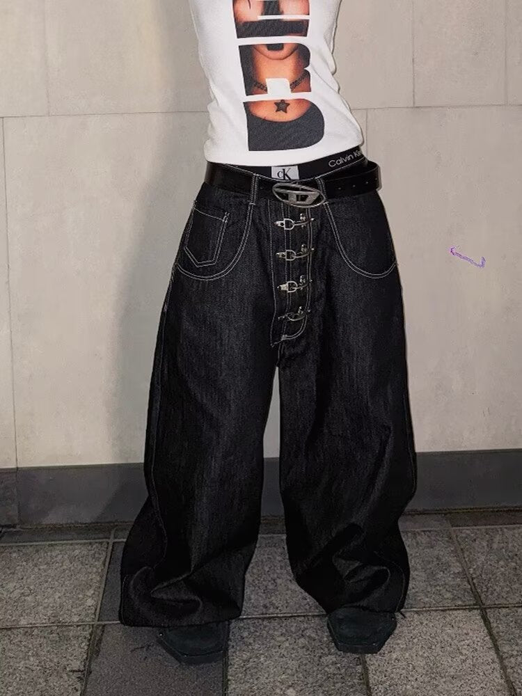 "Aircraft Buckle" Raw-Hem Curved-Leg Jeans