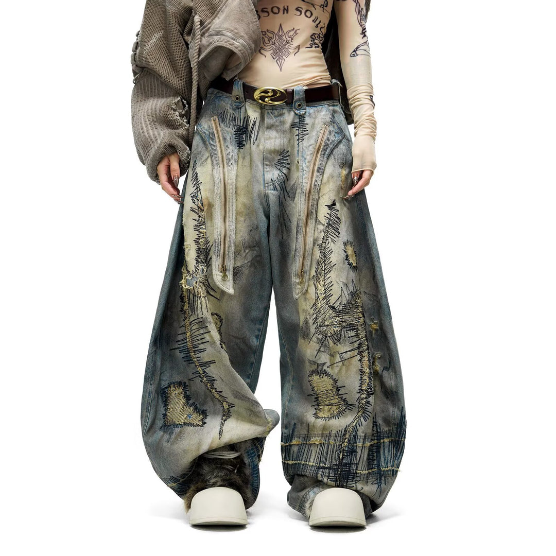 "Random Stitch" Embroidered & Distressed "Scythe" Cut Denim Jeans