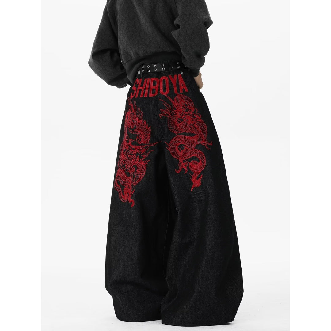 Red dragon embroidered curved blade jeans
