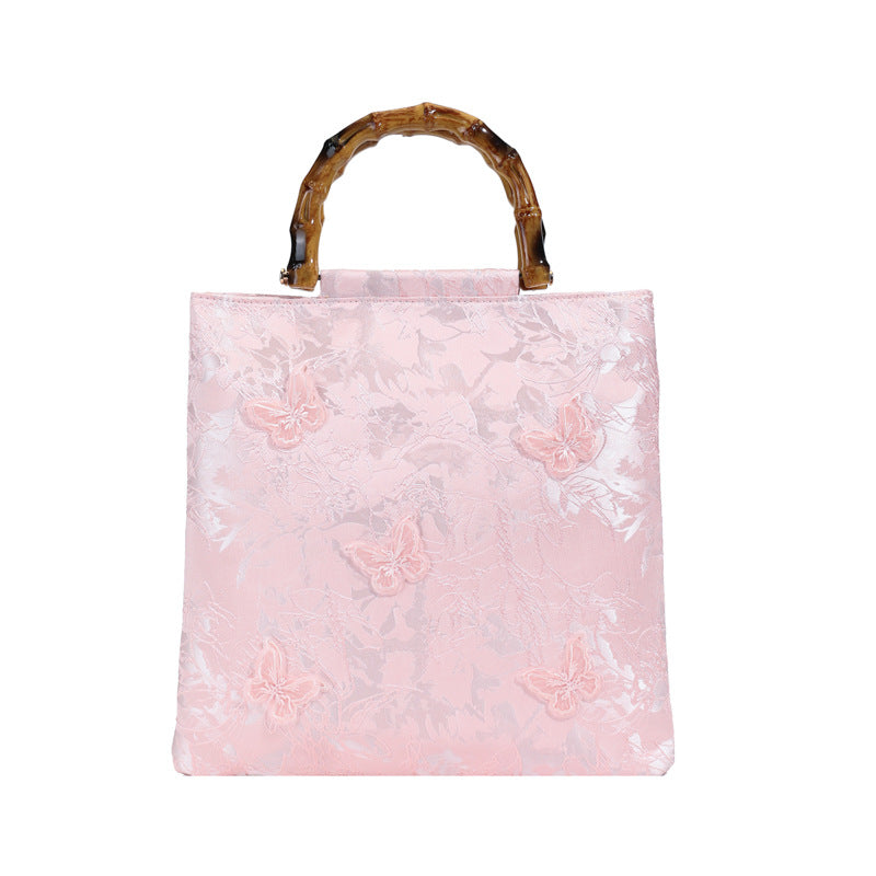 Embroidered sequins linen bamboo handle tote bag