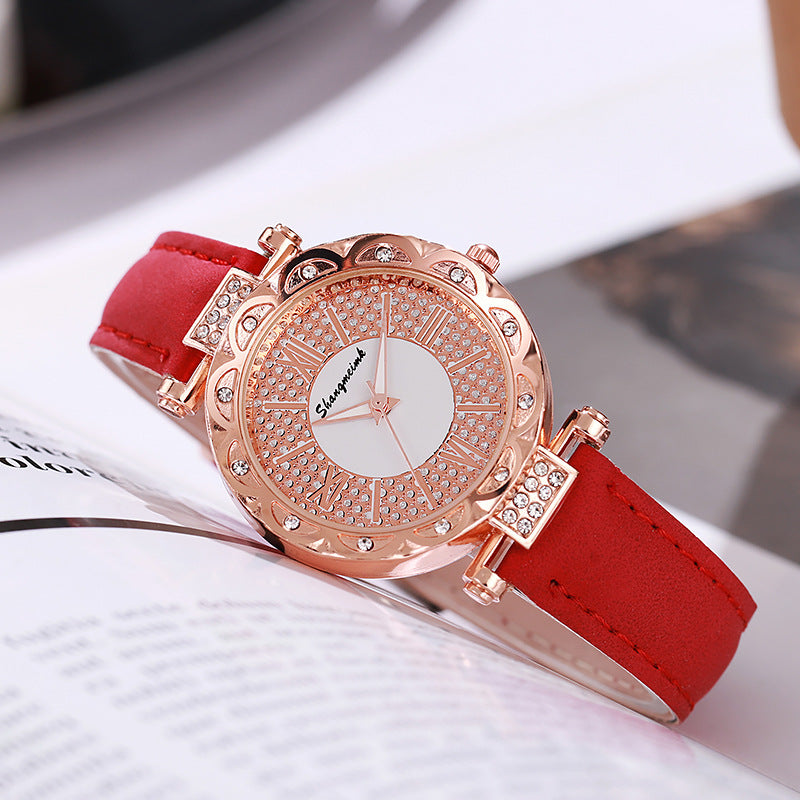 Korean-style quartz watch with a simple leather strap.