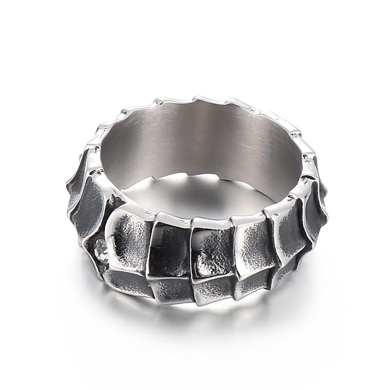 Distressed, minimalist, and stylish dragon-shaped diamond ring