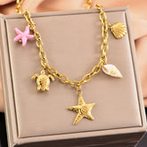 starfish turtle conch gold necklace
