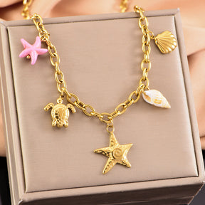 starfish turtle conch gold necklace