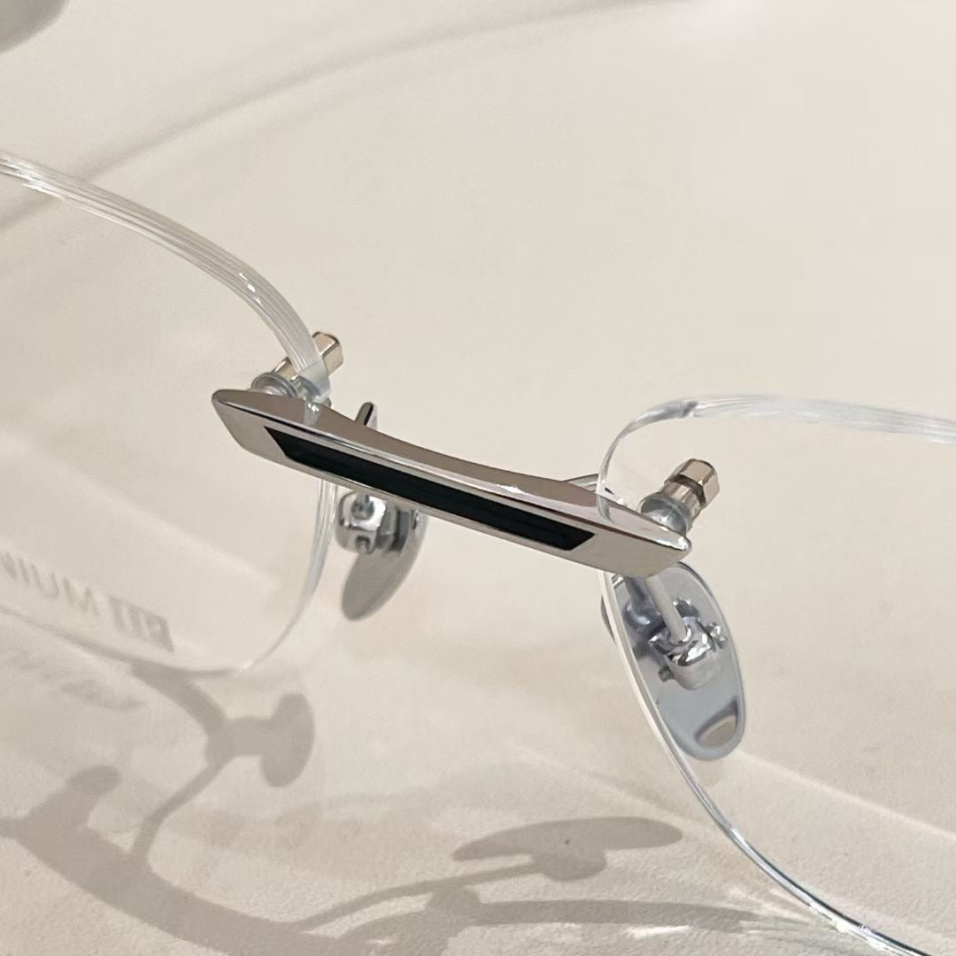 Chrome Hearts rimless oval frame glasses