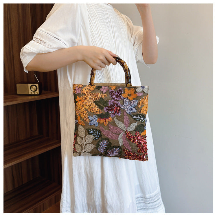 Embroidered sequins linen bamboo handle tote bag