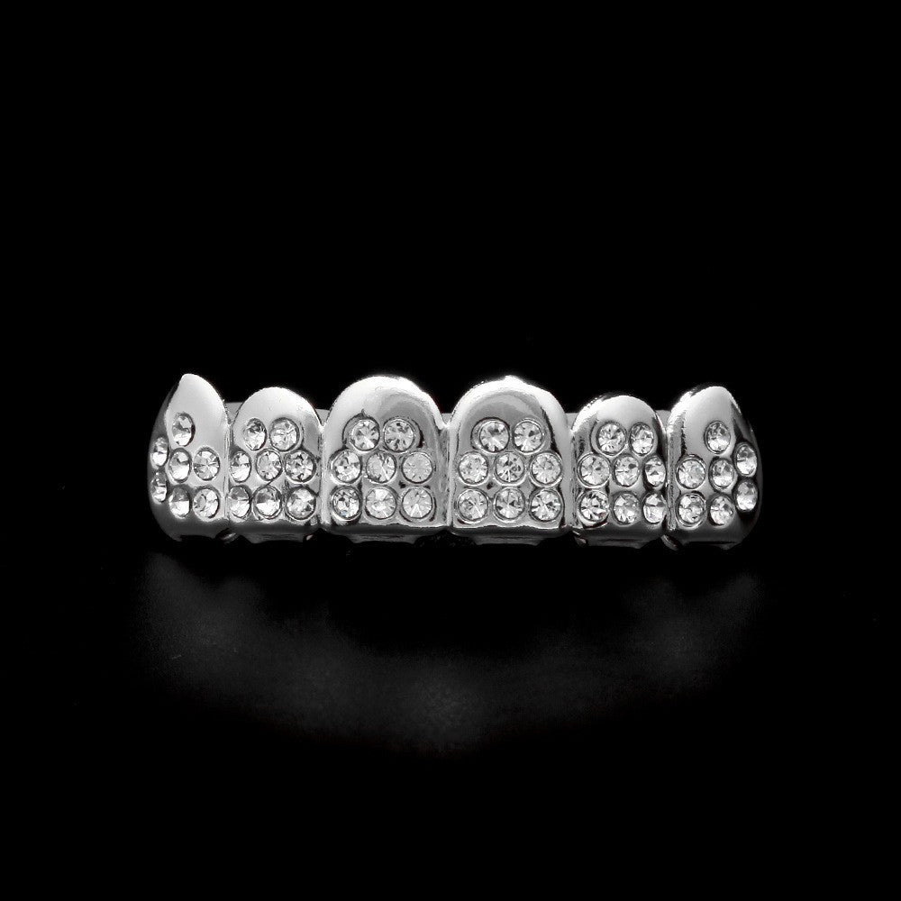 Hip-hop diamond-encrusted and gold-plated teeth grillz