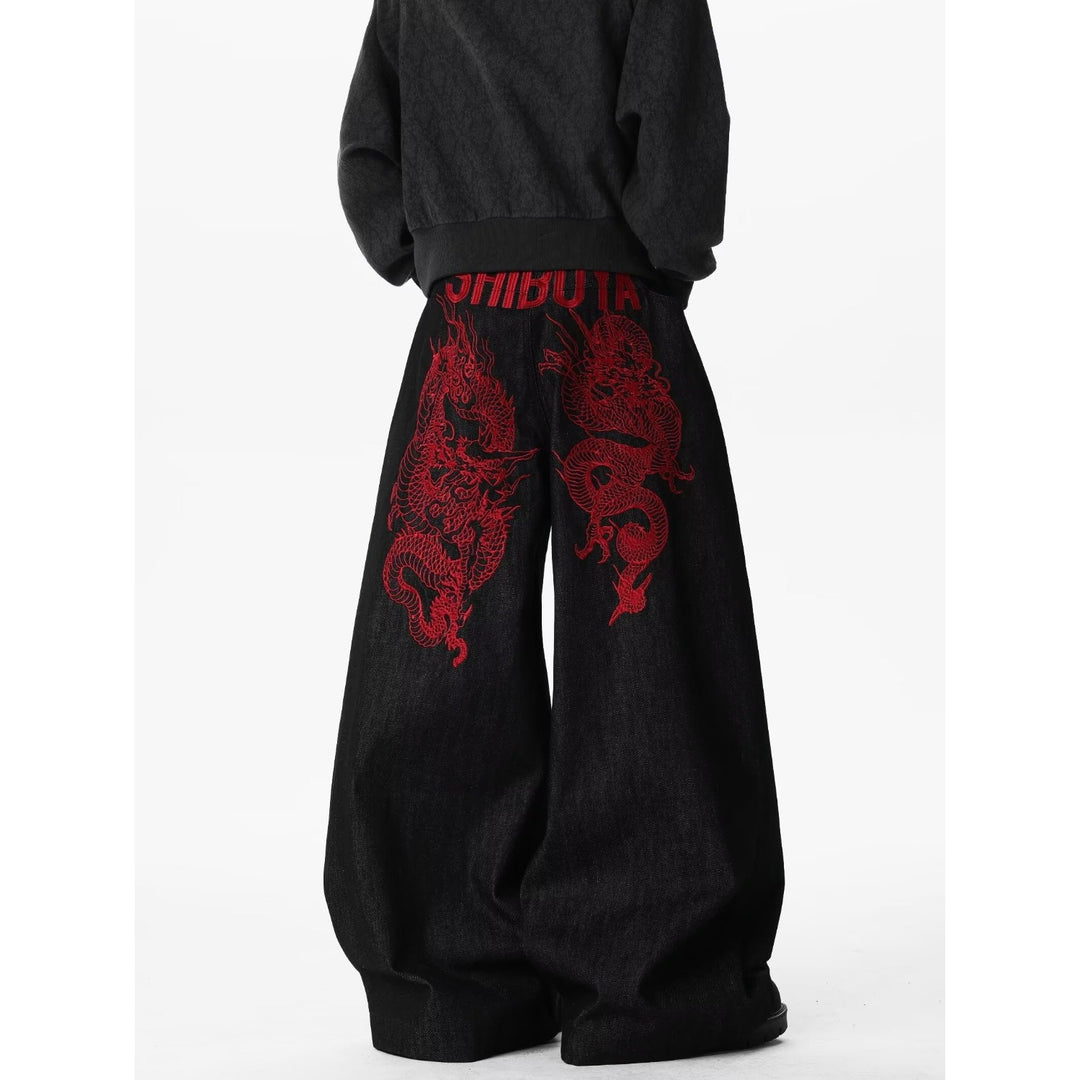 Red dragon embroidered curved blade jeans