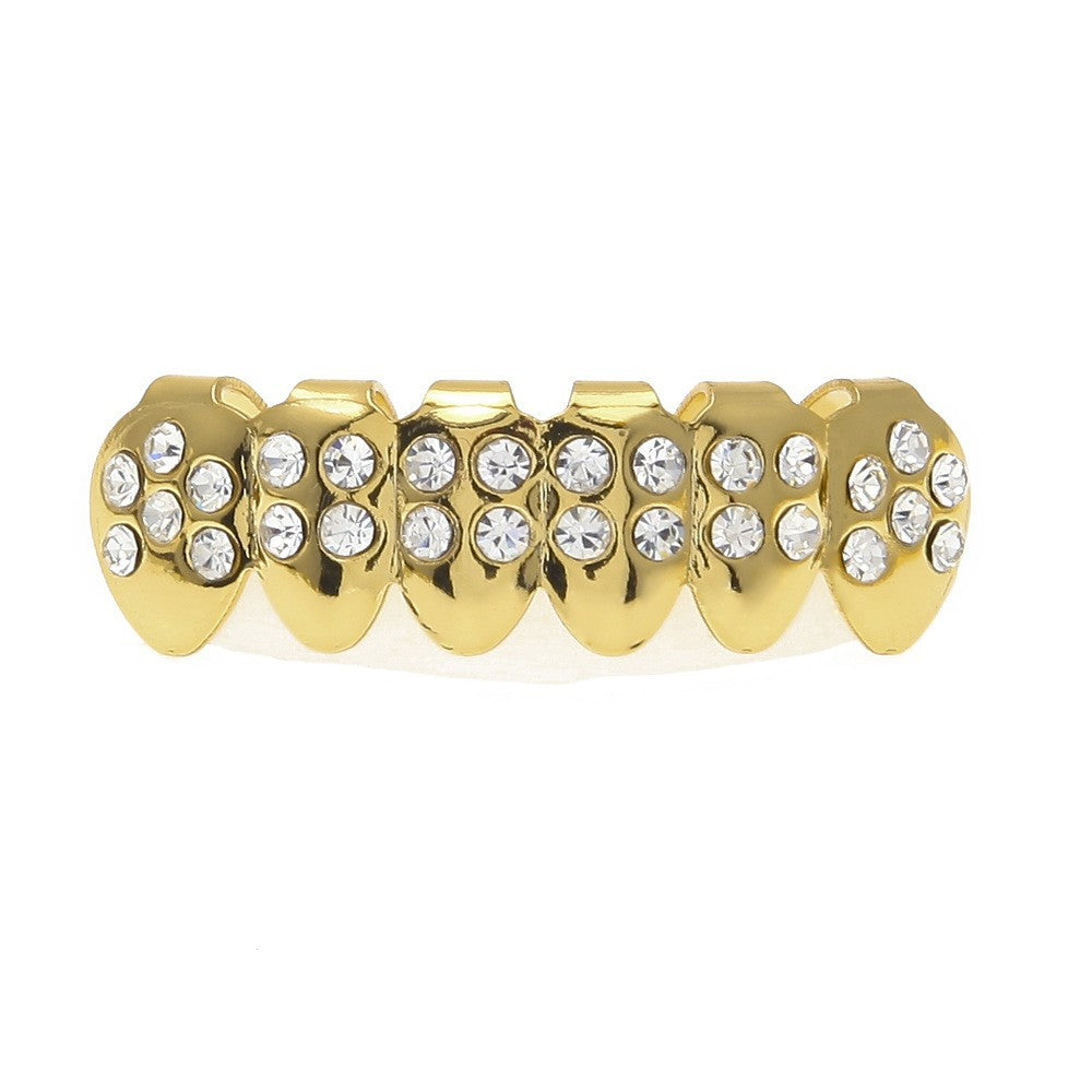 Hip-hop diamond-encrusted and gold-plated teeth grillz