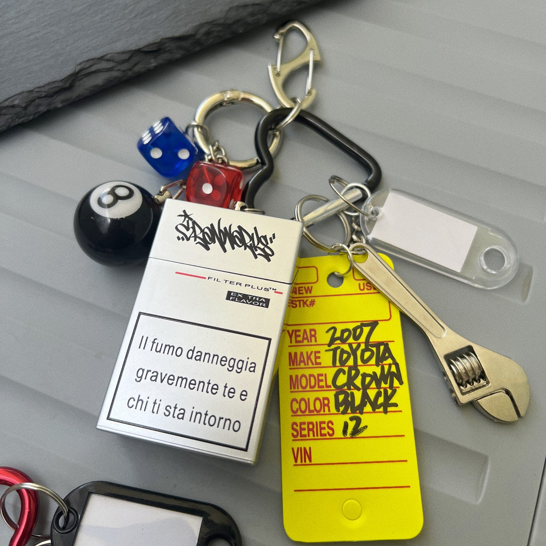 Multi-Element Keychain: Ashtray, Dice, and Wrench