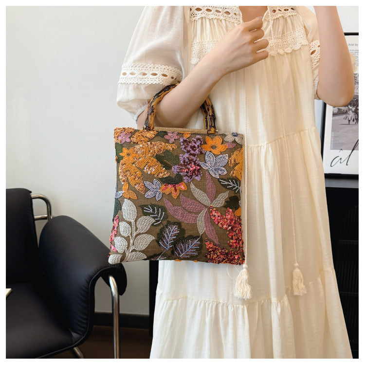 Embroidered sequins linen bamboo handle tote bag