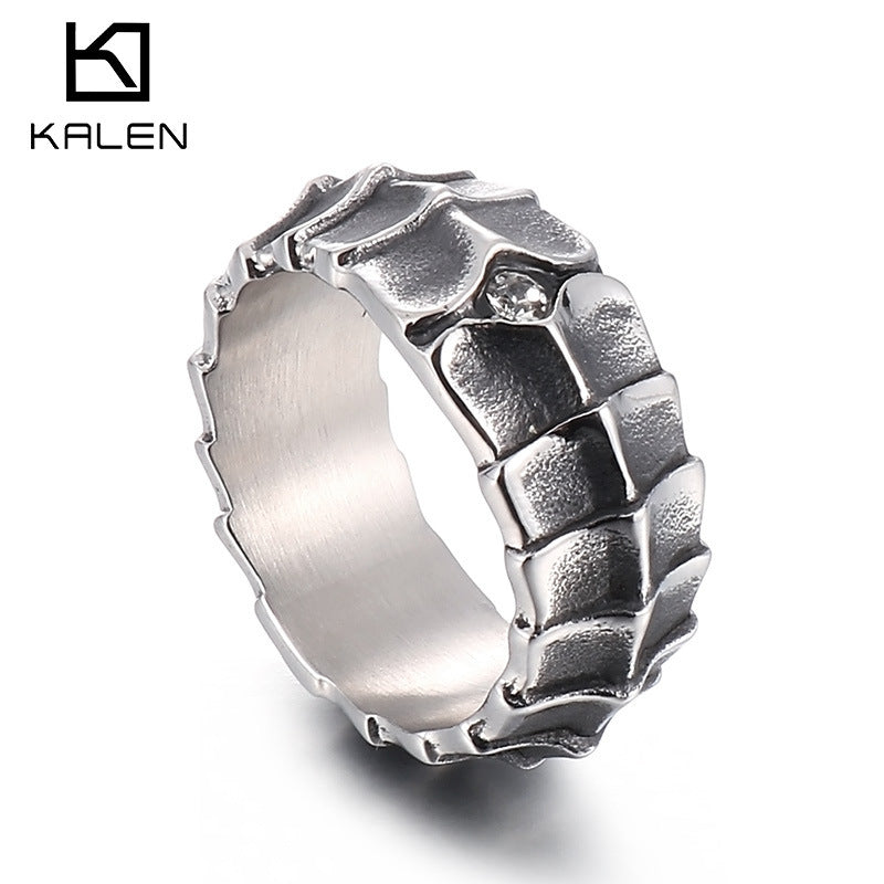 Distressed, minimalist, and stylish dragon-shaped diamond ring