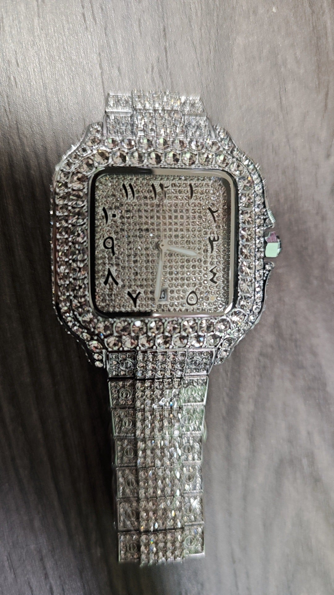 Luxury Diamond-Studded Watch with Classic Roman Dial