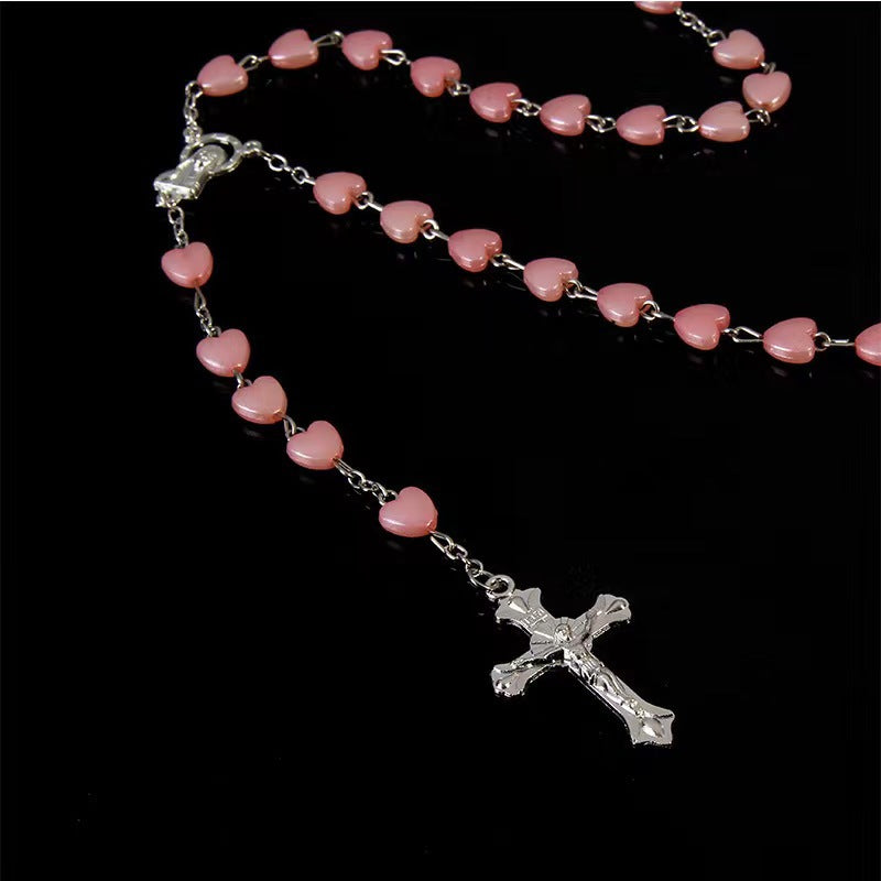 Heart-shaped pink rosary necklace