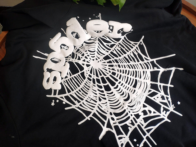 Sp5der fleece-lined hoodie with spiderweb print.