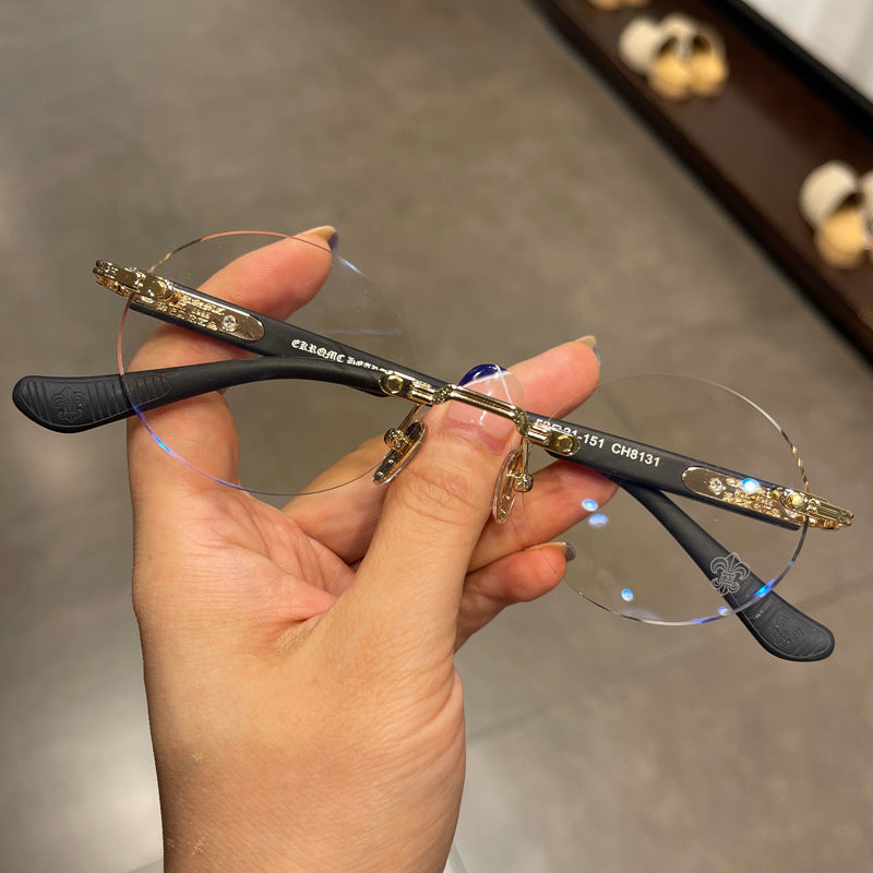 Chrome Hearts frameless round punched retro glasses