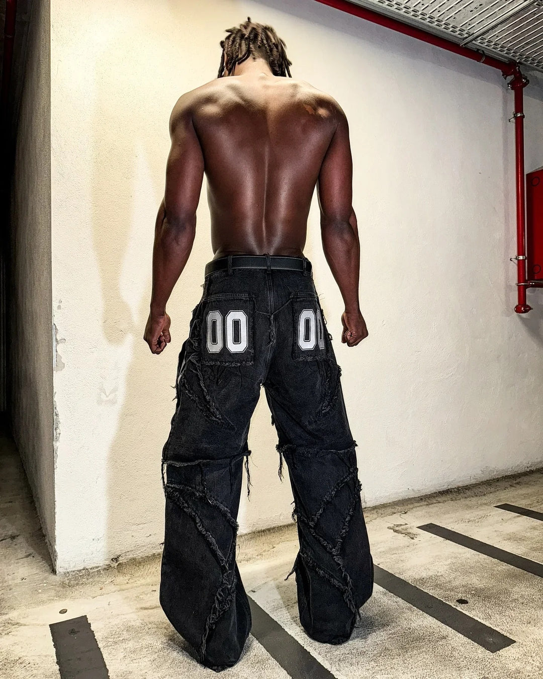 Paneled, Loose-Fit, Embroidered, and Fur-Trimmed Denim Jeans