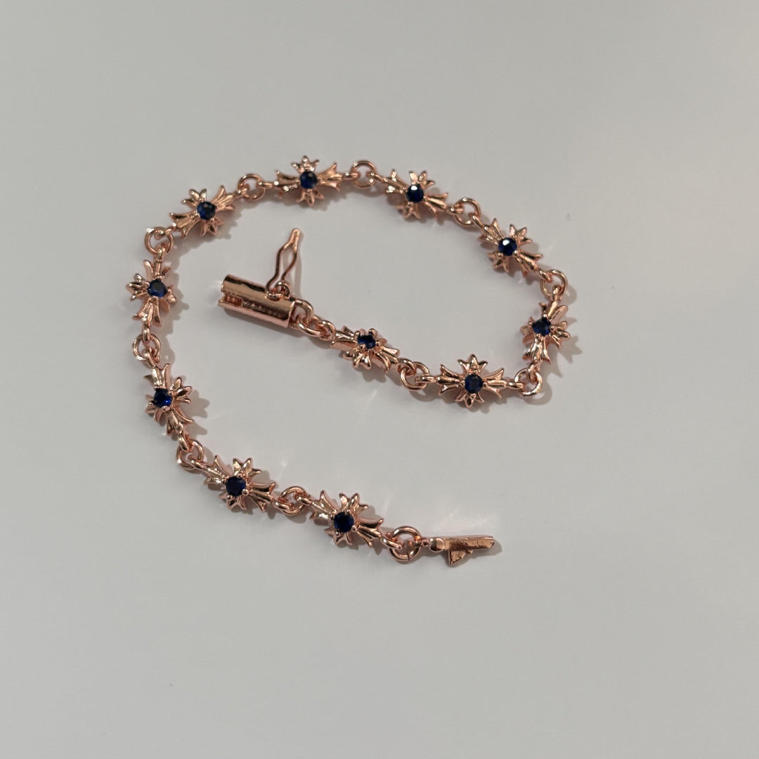 Chrome Hearts rose gold cross diamond bracelet.