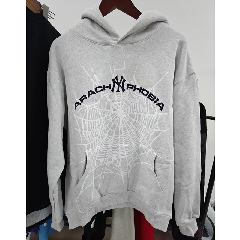 Sp5der fleece-lined hoodie with spiderweb print.