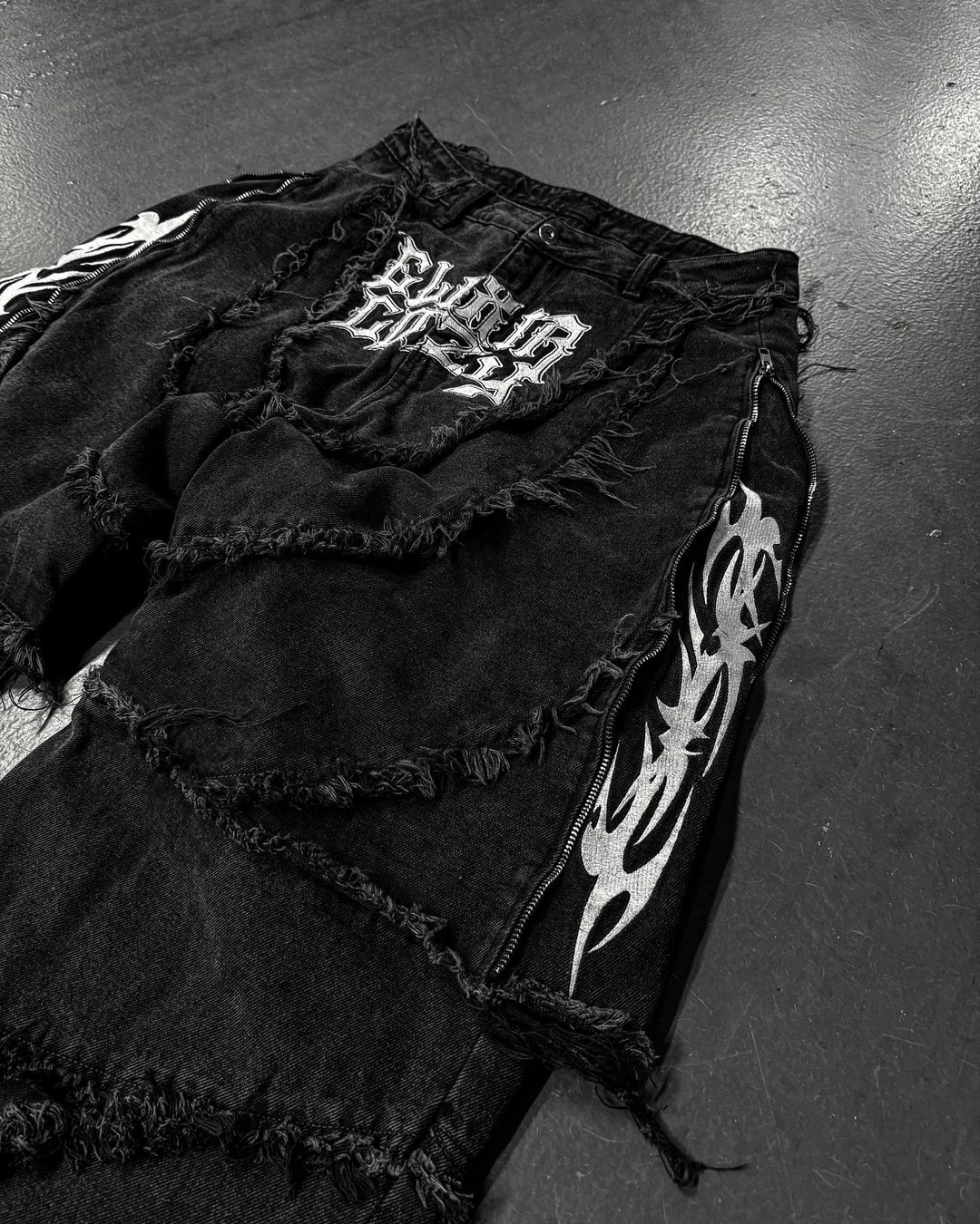 Paneled, Loose-Fit, Embroidered, and Fur-Trimmed Denim Jeans