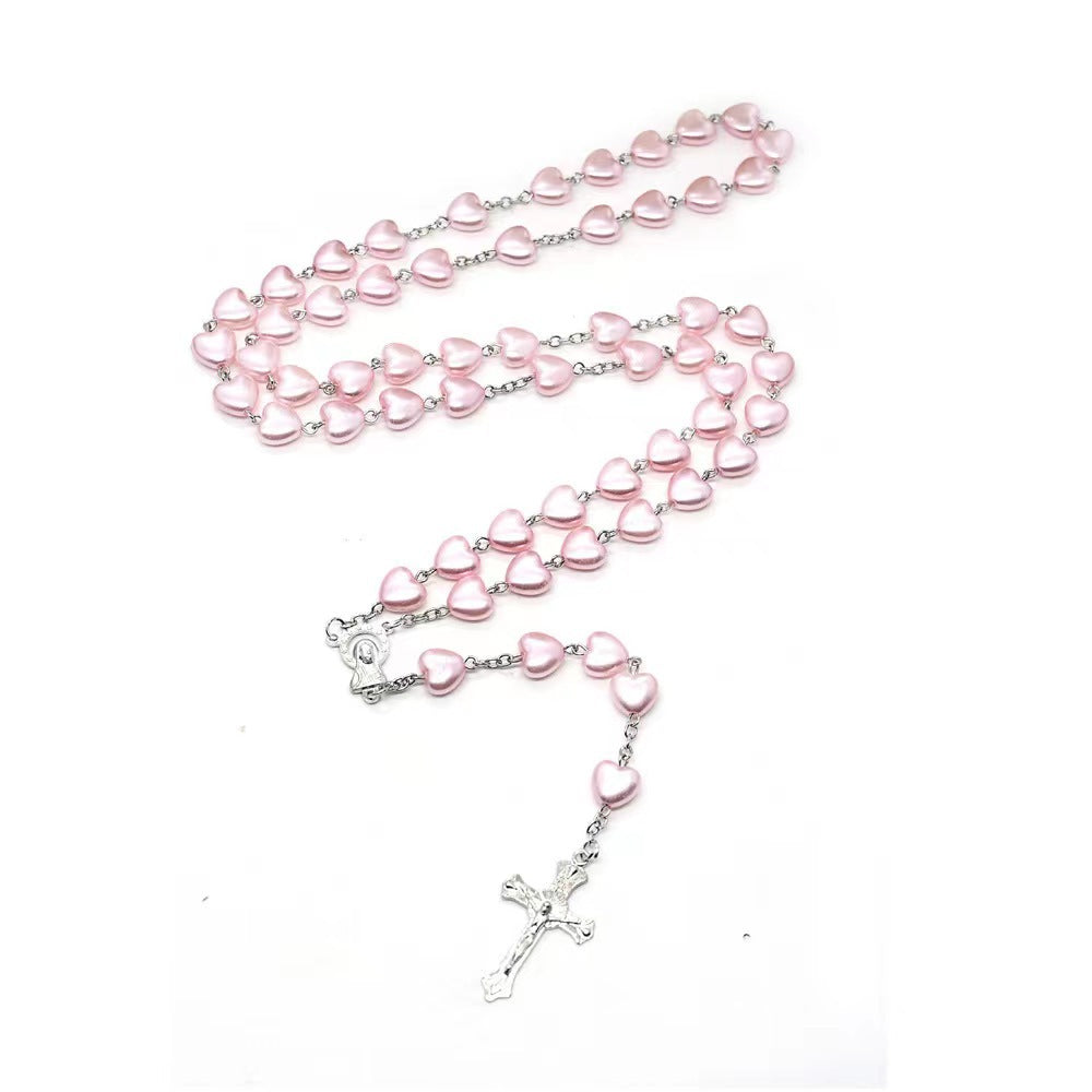 Heart-shaped pink rosary necklace