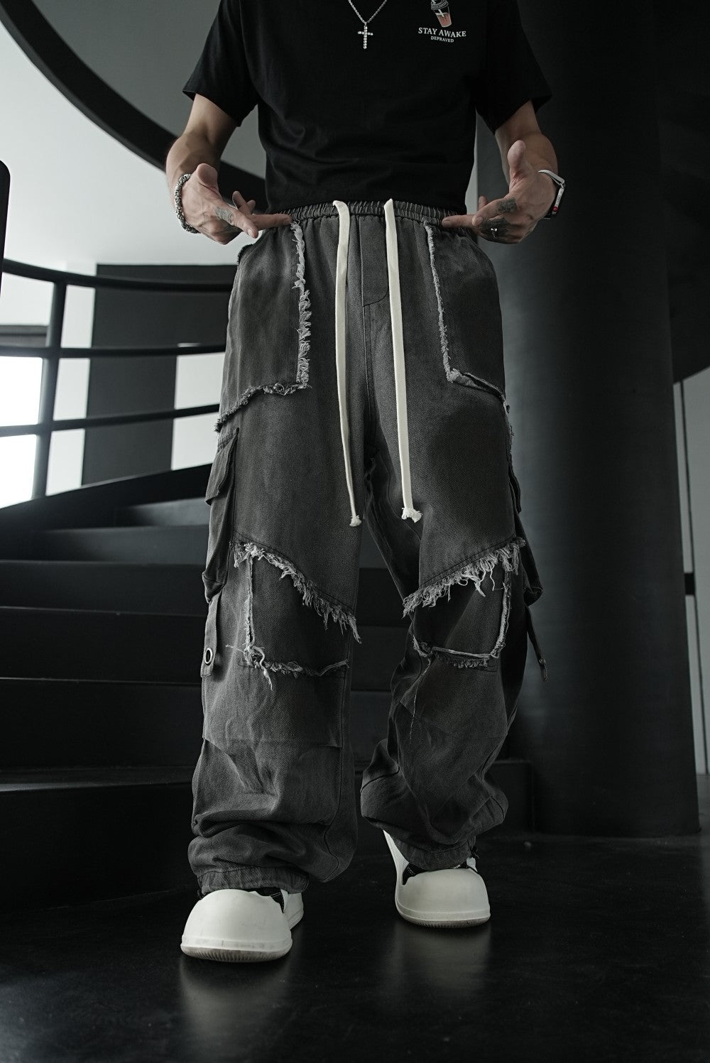 Washed multi-pocket patchwork frayed edges denim jeans