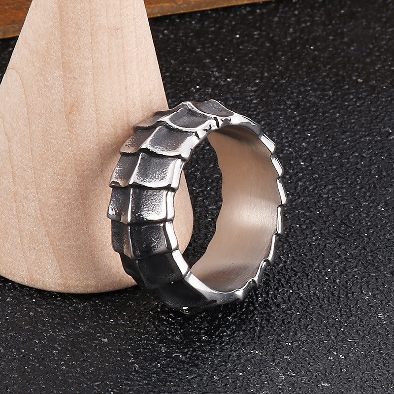 Distressed, minimalist, and stylish dragon-shaped diamond ring