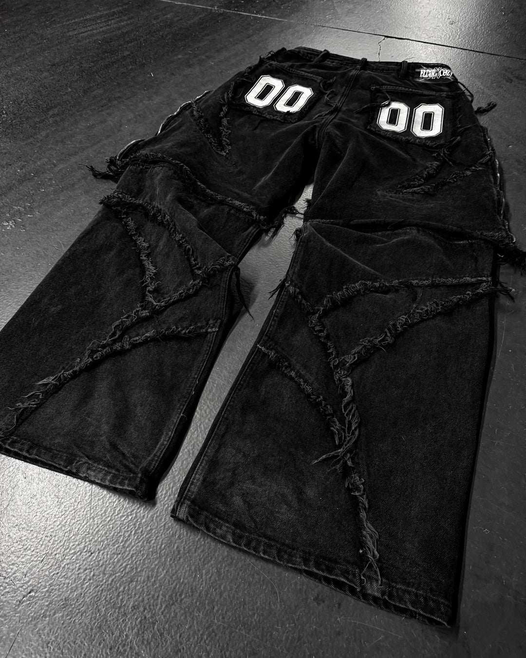 Paneled, Loose-Fit, Embroidered, and Fur-Trimmed Denim Jeans