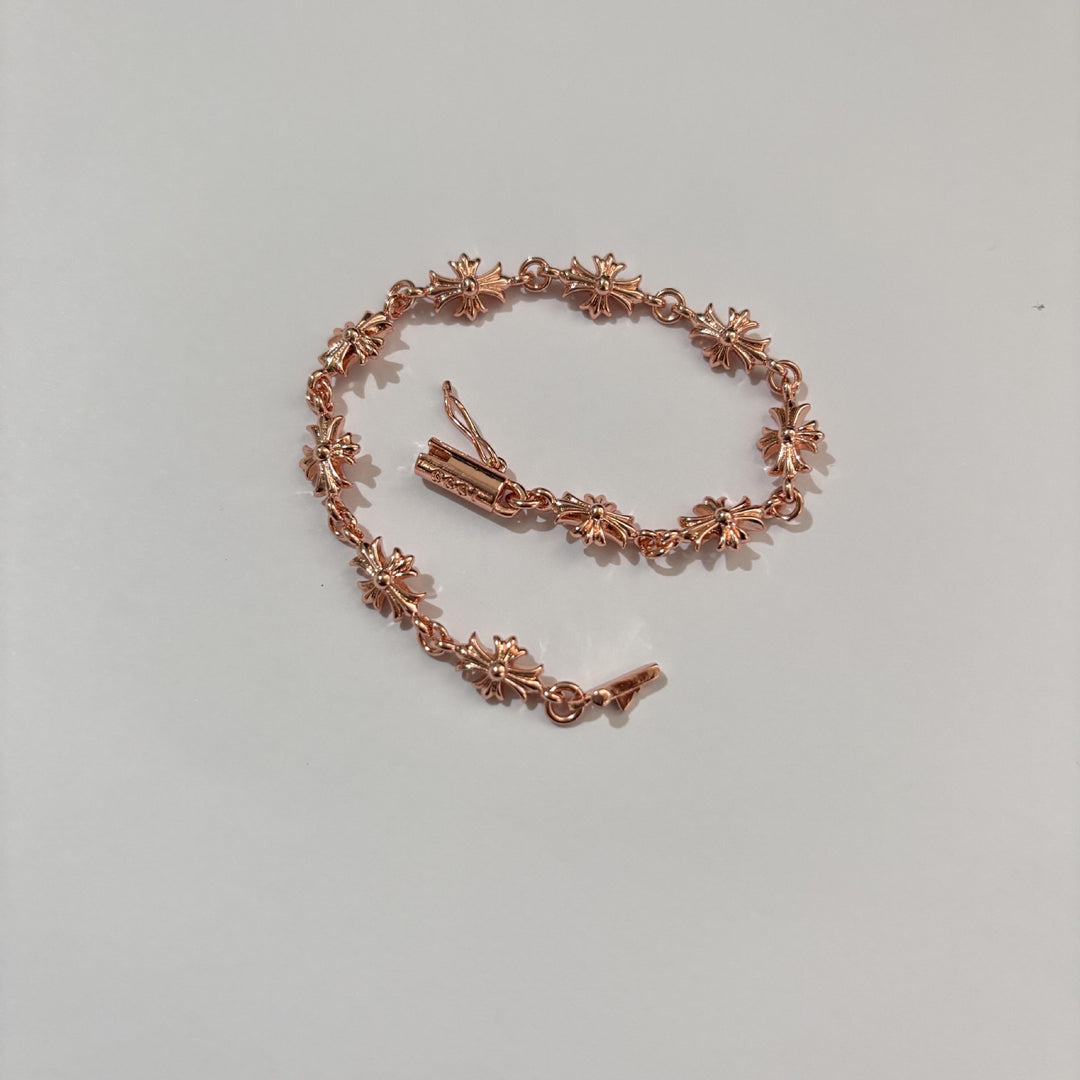 Chrome Hearts rose gold cross diamond bracelet.