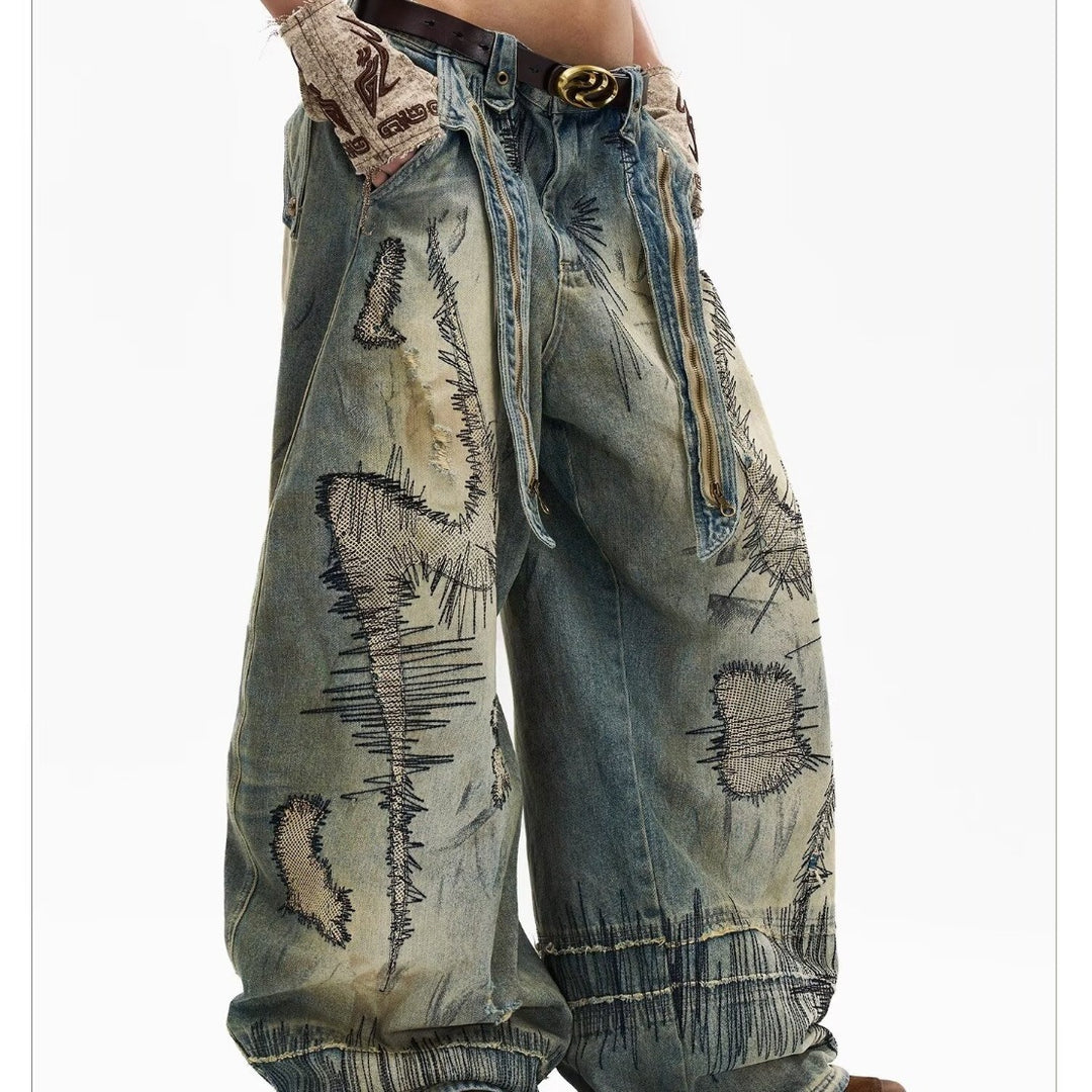 "Random Stitch" Embroidered & Distressed "Scythe" Cut Denim Jeans