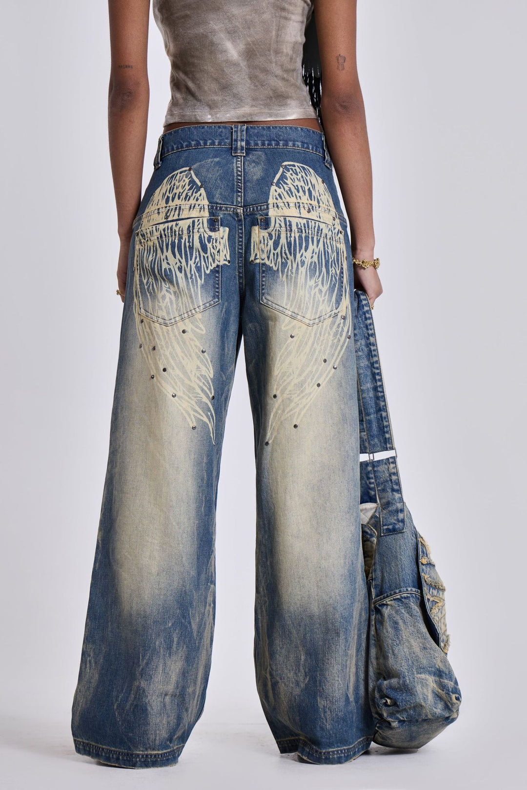 Washed & Distressed Wide-Leg Jeans with Gradient Wing Print